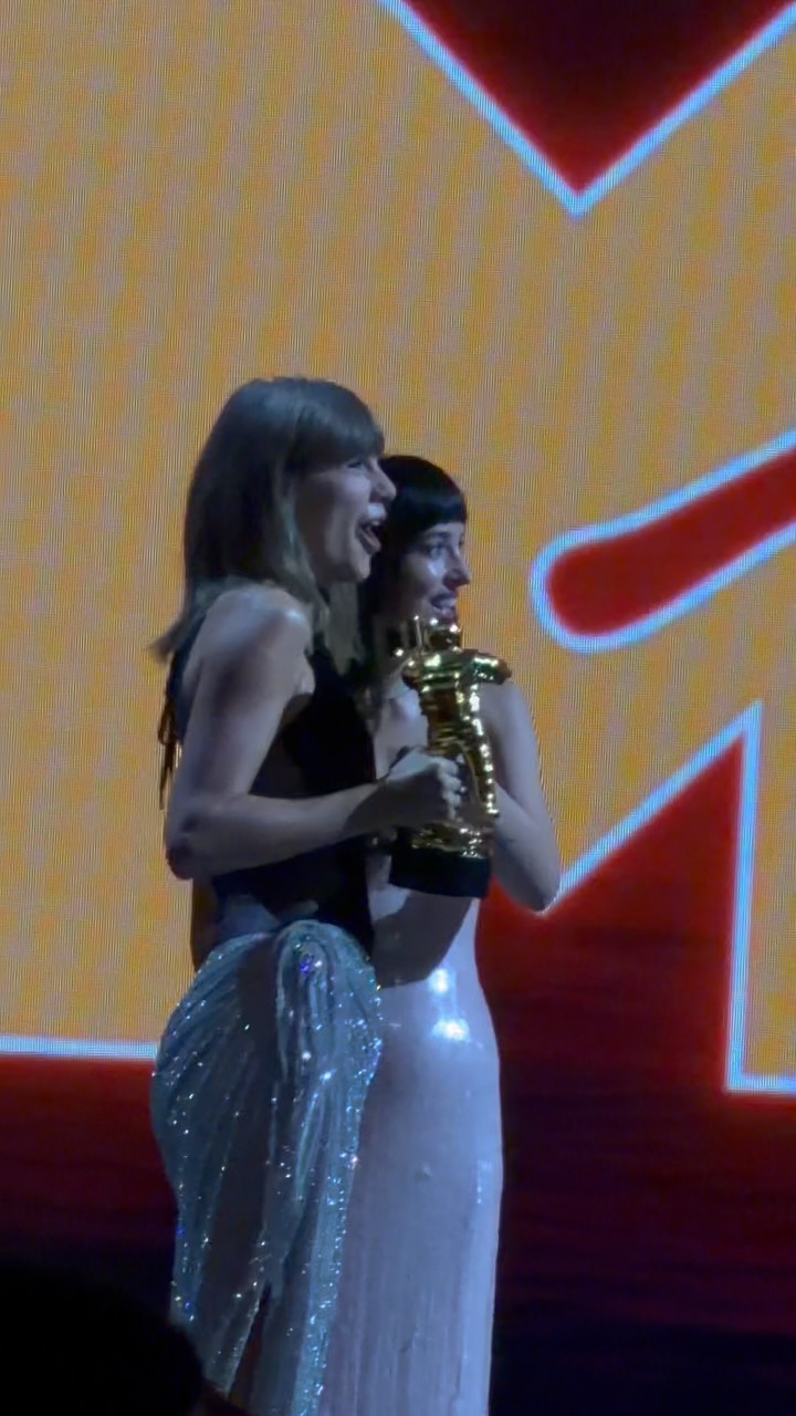 Taylor Swift's watching the chaos with us, and we're unwell